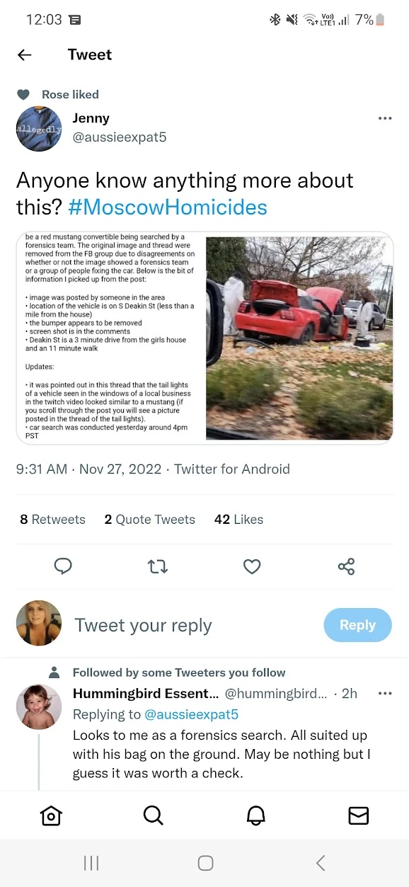 Phone screenshot of a social-media post asking about a photograph of red and white vehicles, with a text inset and replies below.