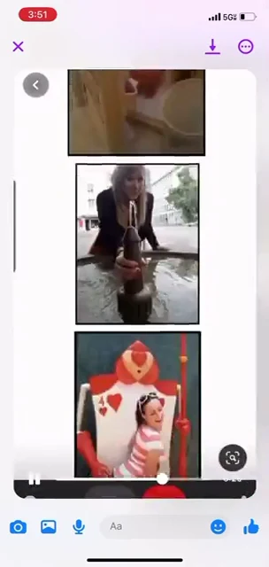 Phone video screenshot of a scrolling image board with posed people and a red cartoon-character statue.