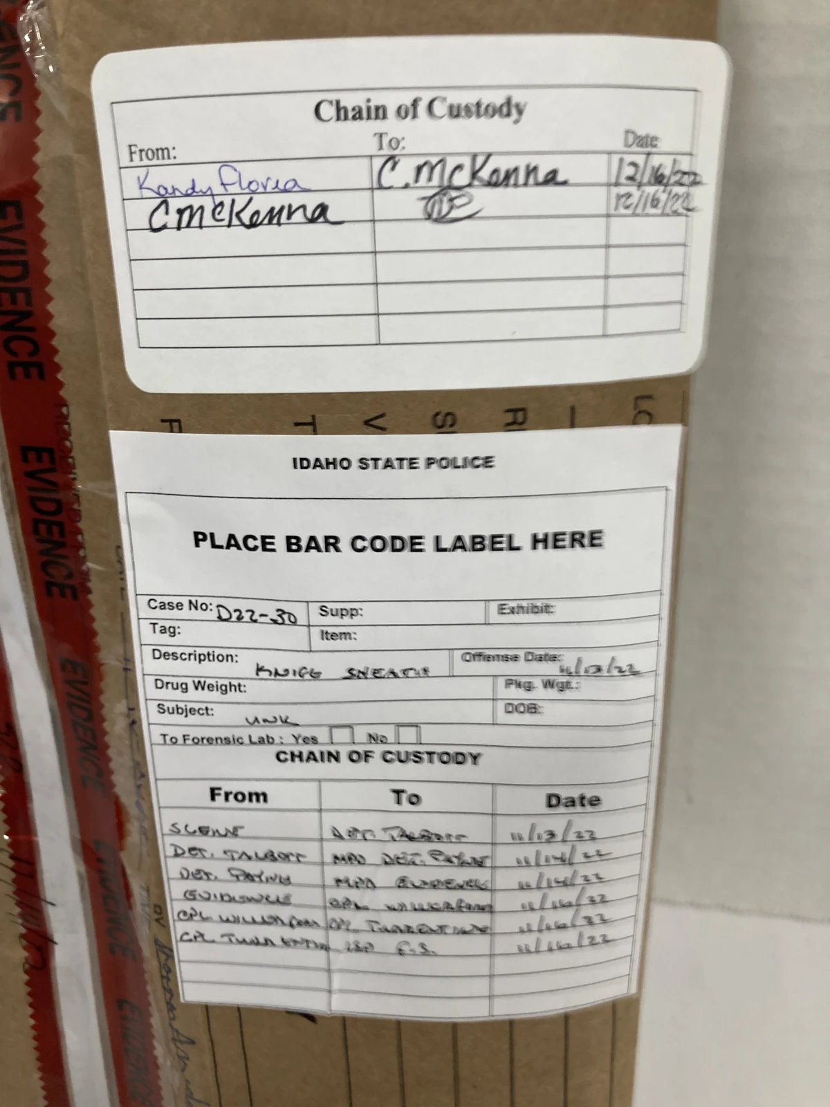 Evidence packaging with handwritten chain-of-custody labels and an Idaho State Police form.