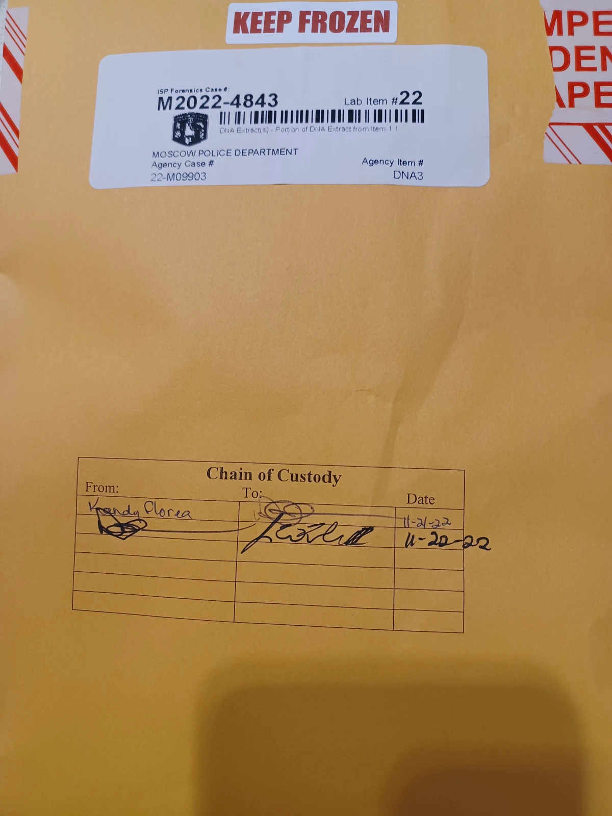 Yellow evidence envelope with a Keep Frozen label, a Moscow Police Department barcode label and handwritten chain-of-custody entries.
