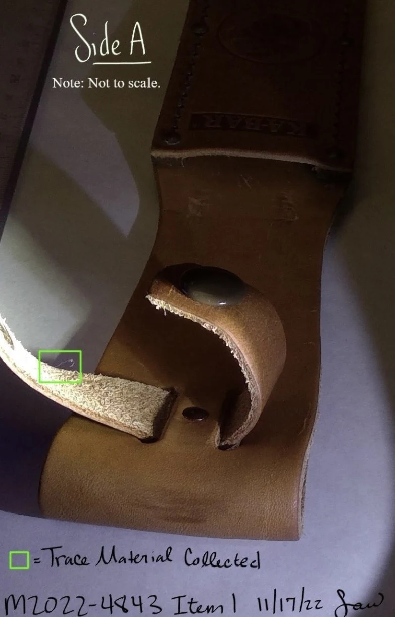 Close photograph of a leather sheath fastening strap and snap under directional light, with a green box marking a trace-material collection area; annotation says not to scale.