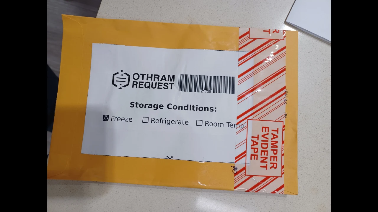 Yellow envelope with an Othram Request barcode and storage-conditions label, Freeze checked, and red-striped tamper-evident tape.