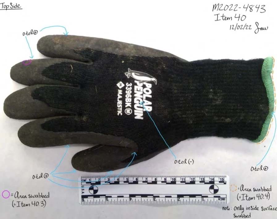 Back of a black Polar Penguin work glove with green cuff, beside a measurement scale and colored swab-area annotations.