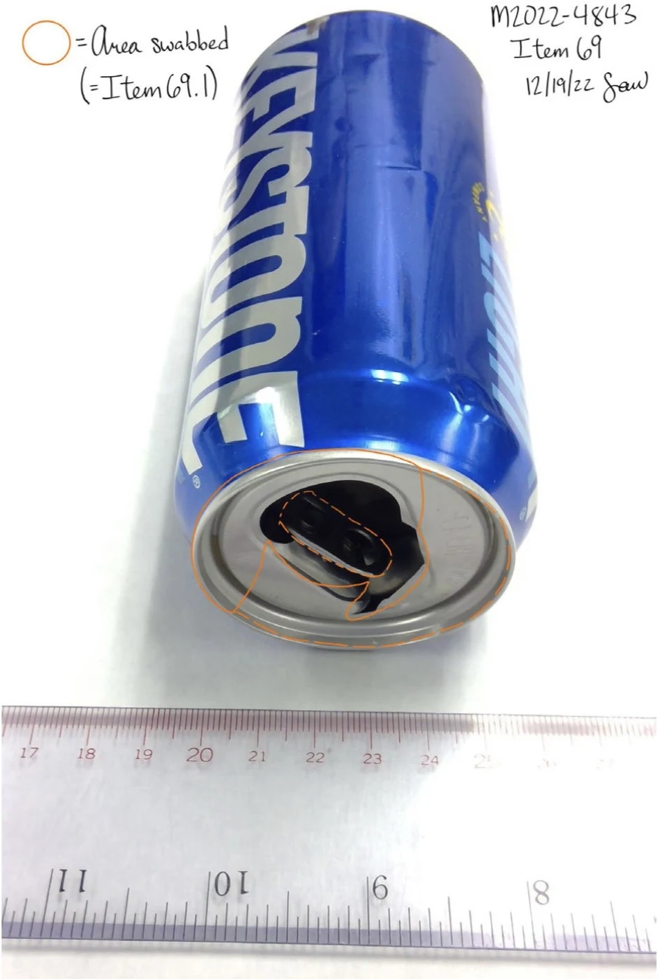 Blue Keystone can with an open top, beside a ruler and an orange swab-area outline around the rim.