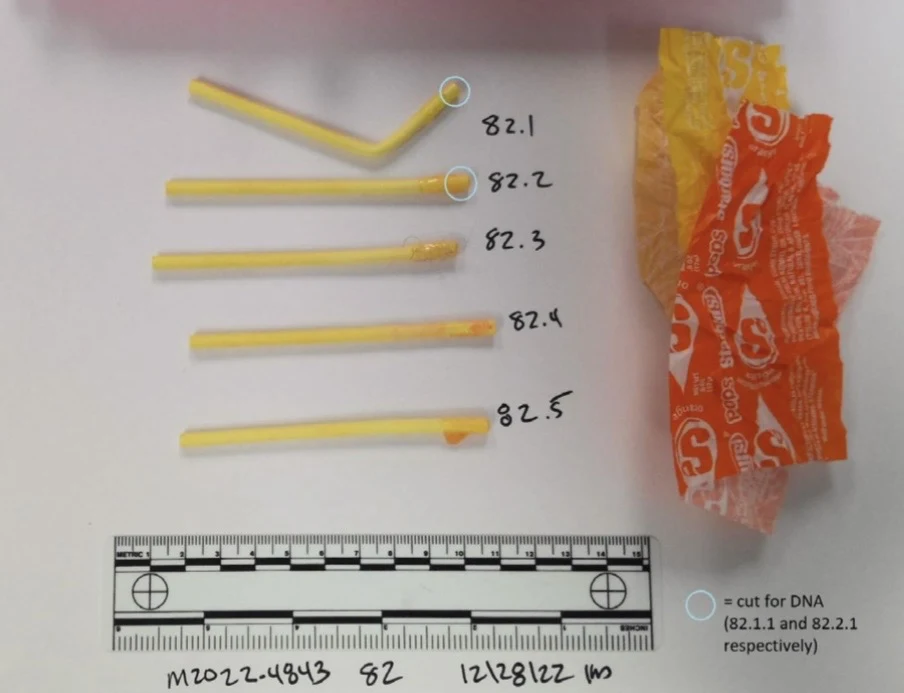 Five yellow drinking straws or straw sections beside orange wrappers and a measurement scale, with numbered labels and sampling circles.