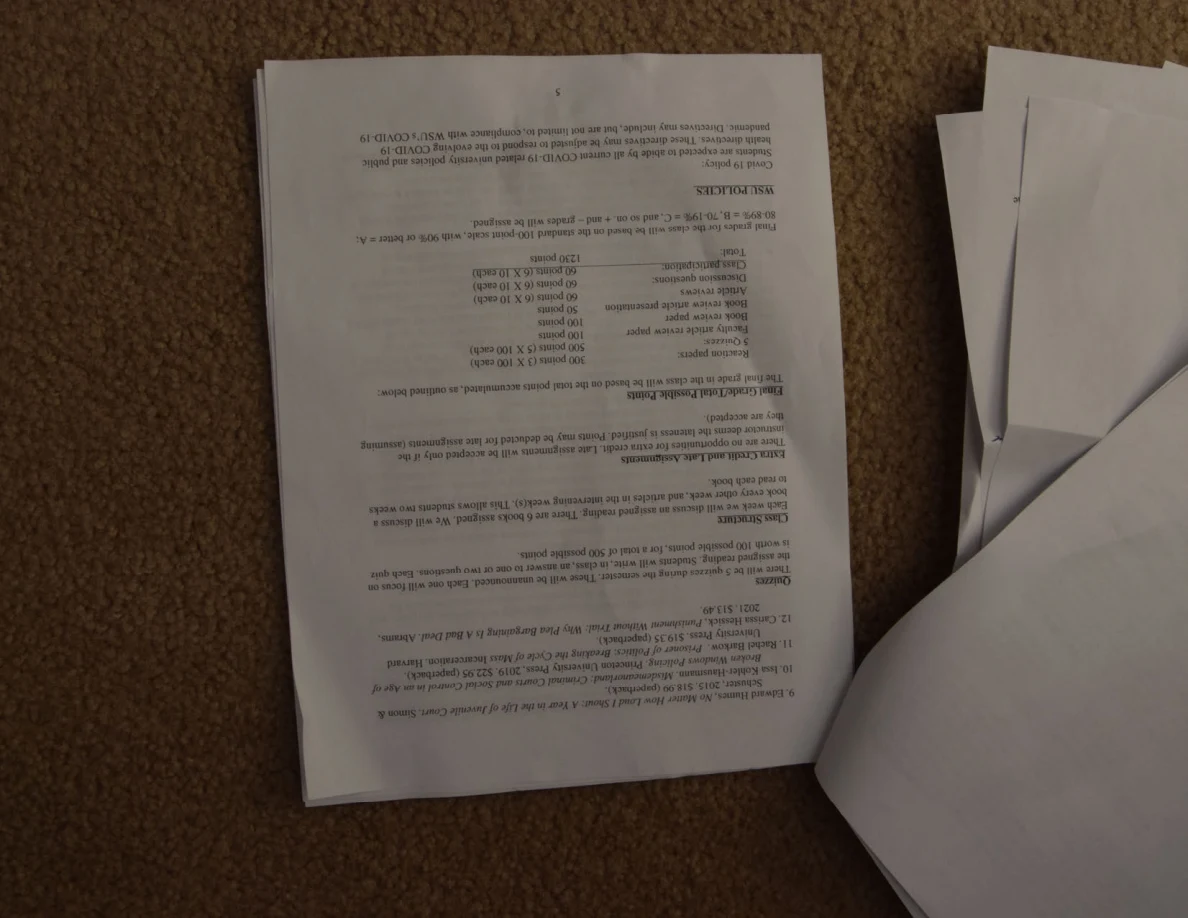 Upside-down course handout with a grading table and final-exam section.