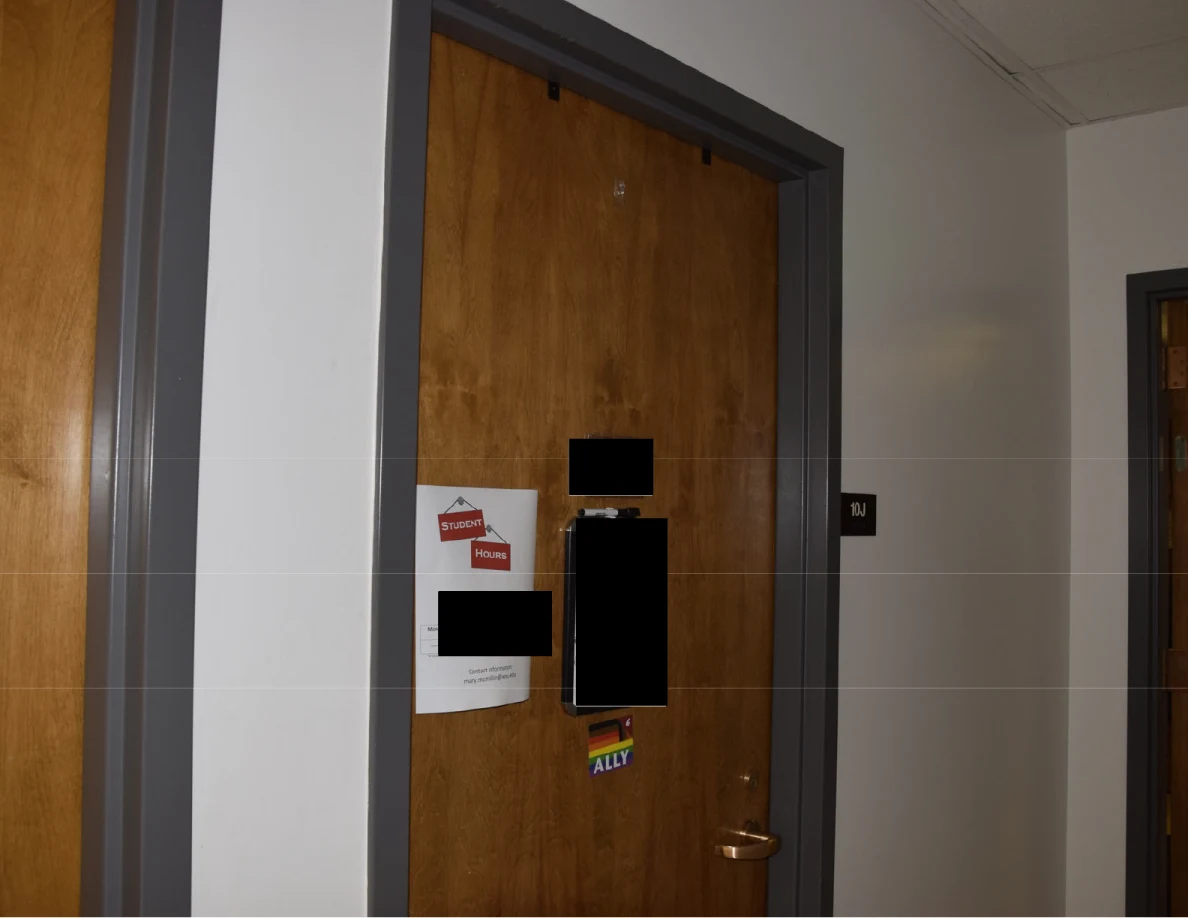 Office door with student-hours notice, stickers and blacked-out text.