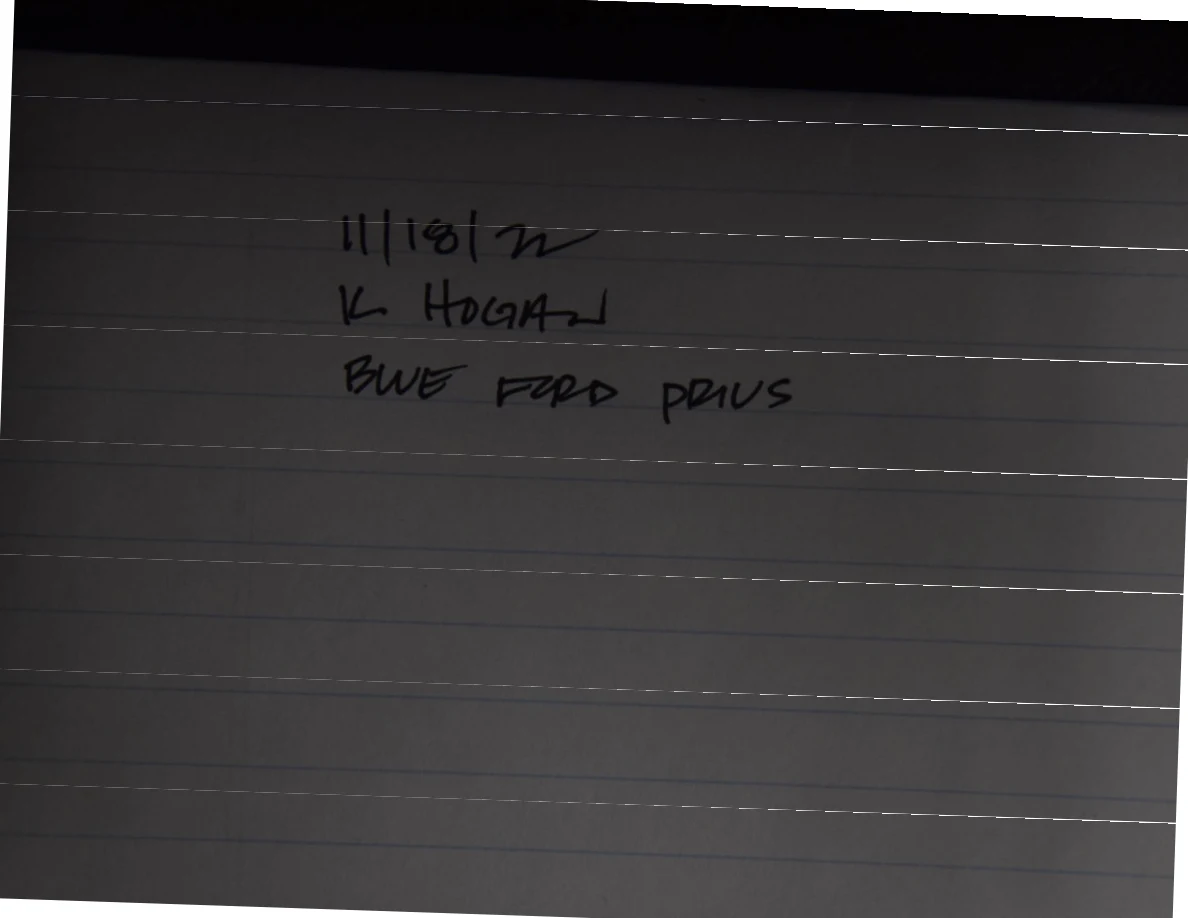 Handwritten identification card on lined paper referring to a blue Toyota Prius.
