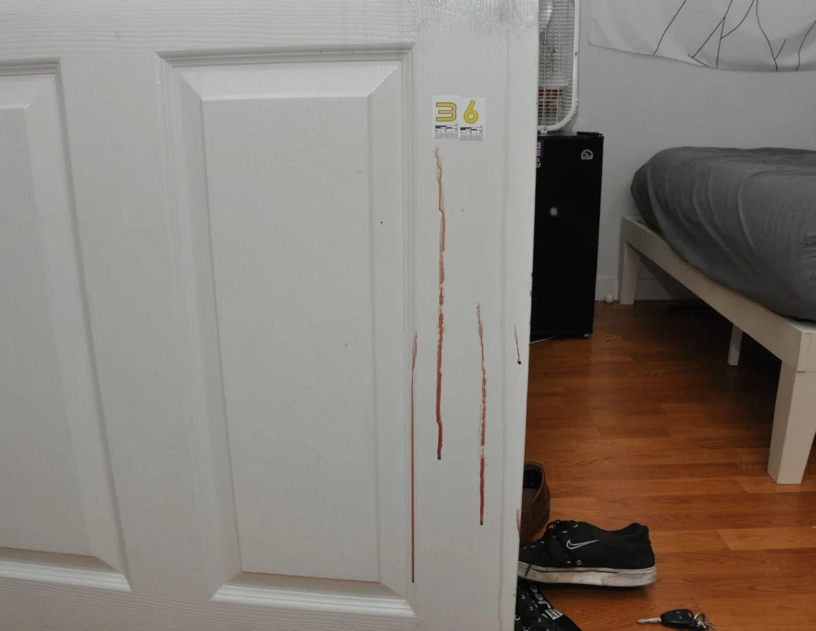 Vertical reddish door streaks below scale label 36.