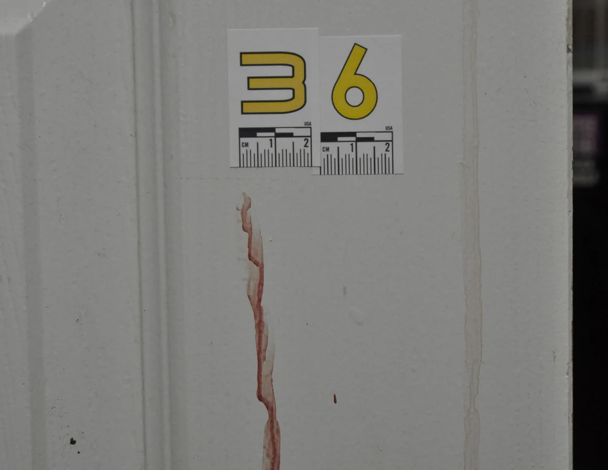 Close view of scale label 36 above a reddish door streak.