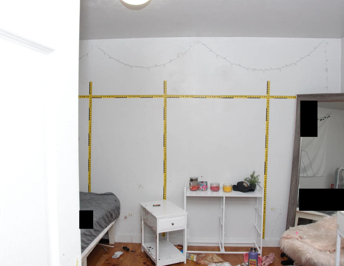 Yellow wall scales above white furniture and a tall mirror.