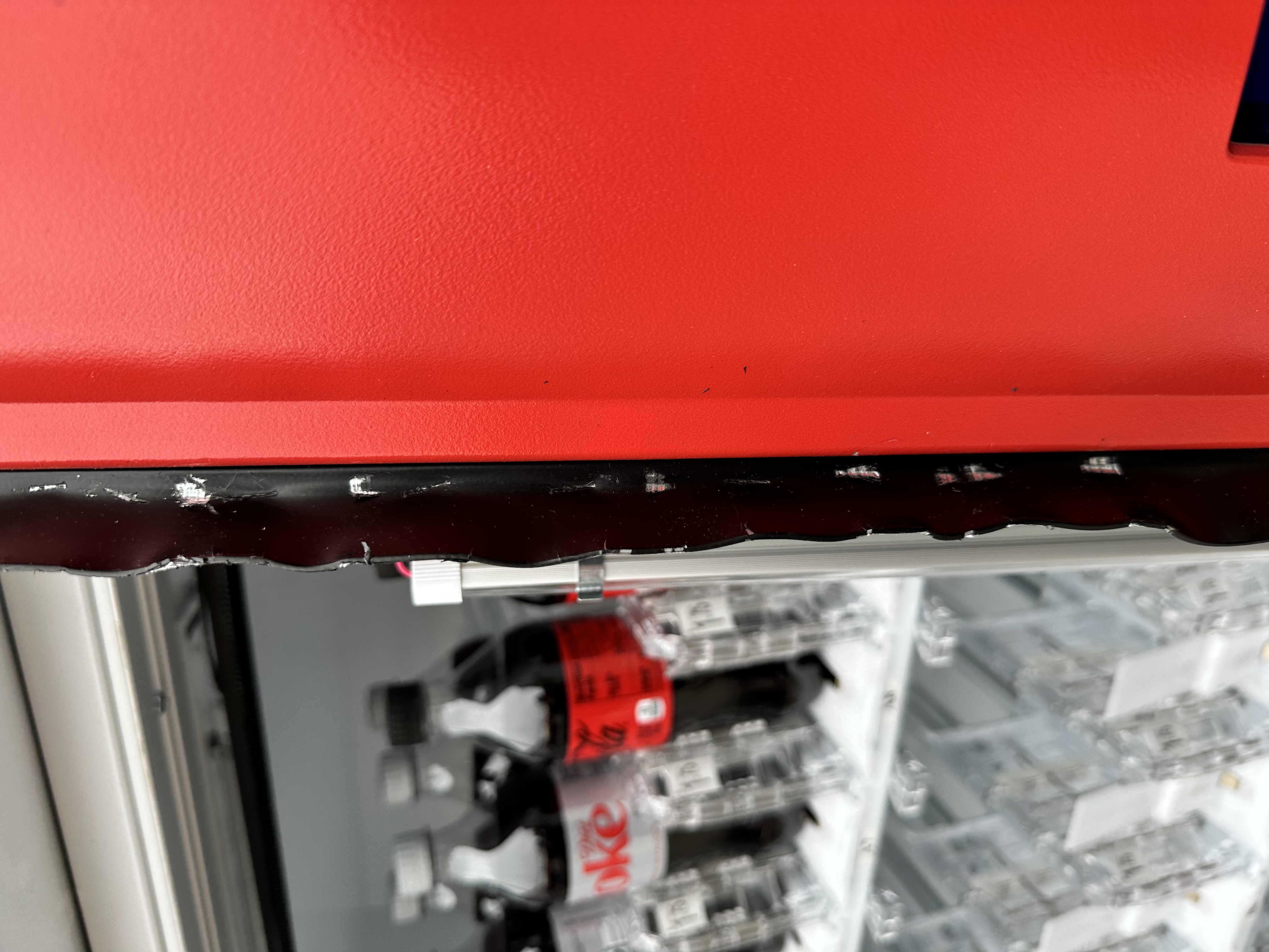 23-M00107 Mal Mischief — Alternate view of Coke Machine Damage.JPG.jpg